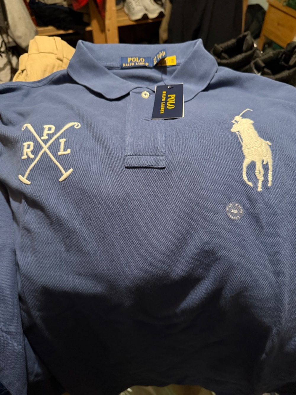 Blue Polo Shirt with White Logo
